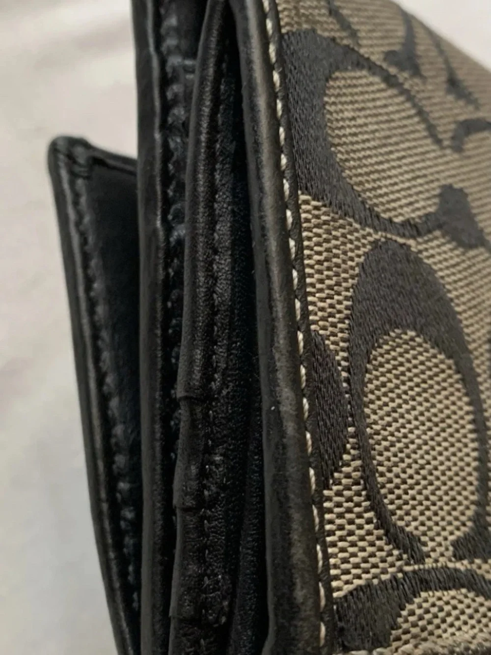 Coach Monogram Foldover Wallet in Black and gray leather interior